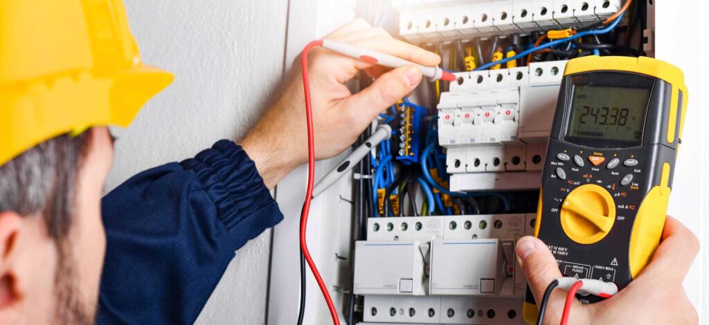 electrician checking electrical equipment