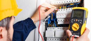 electrician checking electrical equipment