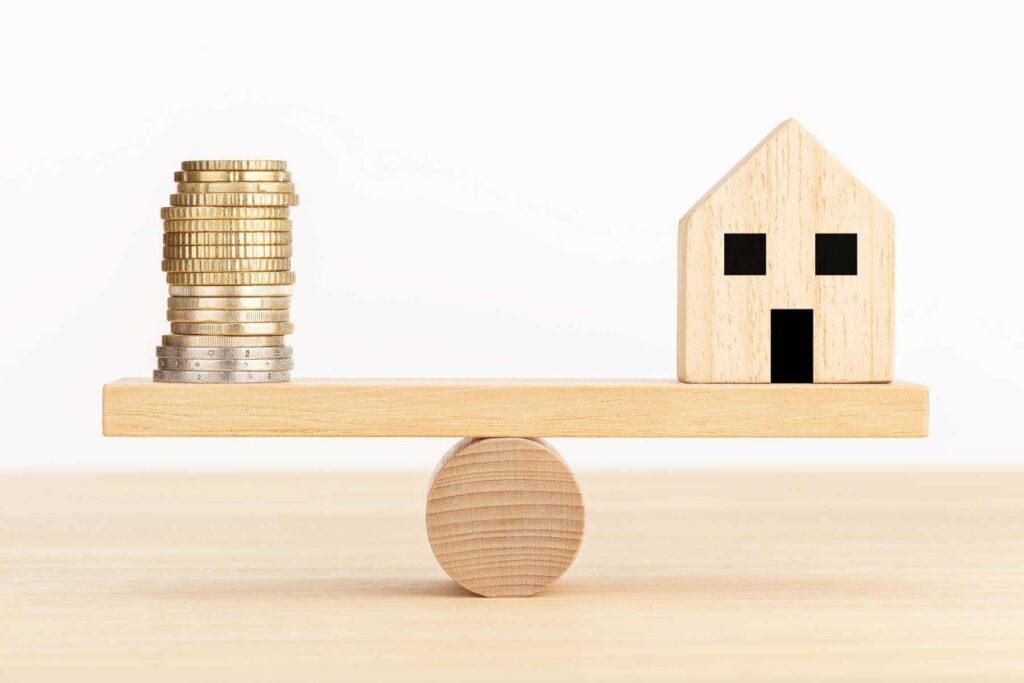 a house and a house on a scale