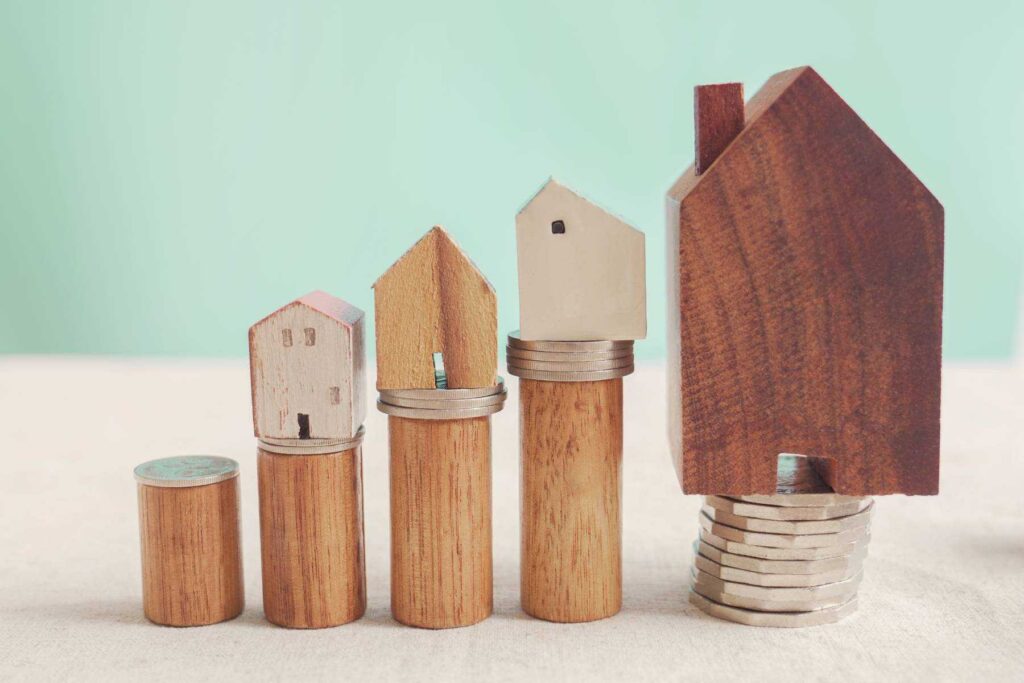 wooden houses and coins