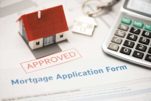 mortgage application form with house and calculator