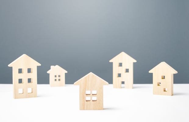 wooden houses on a white surface