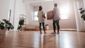 a couple moving into their new home