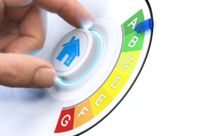a hand pushing a button on a white background