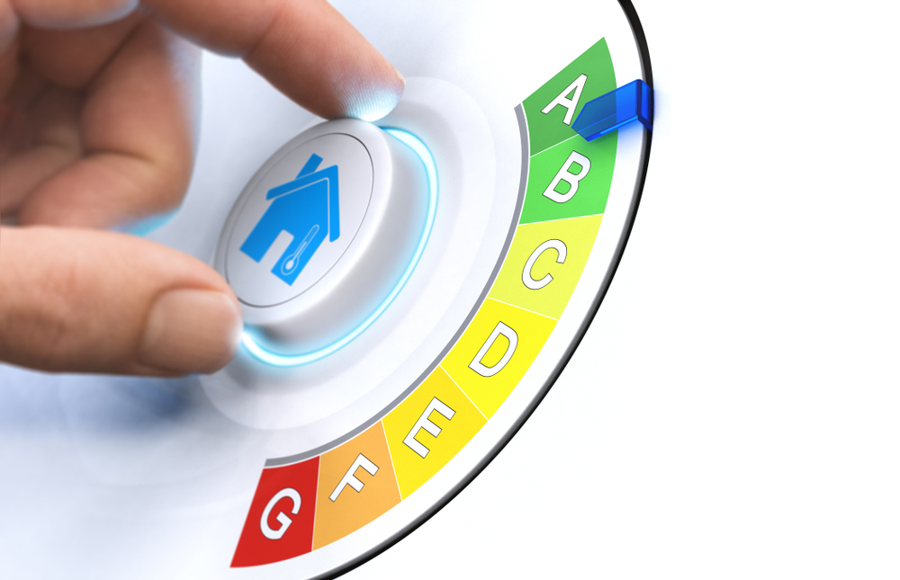 a hand pushing a button on a white background
