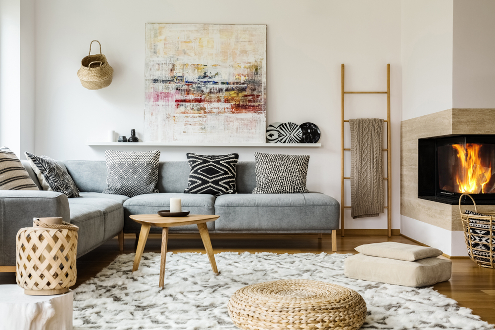 a living room with a fireplace and a couch