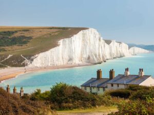 a view of the beach and white cliffs