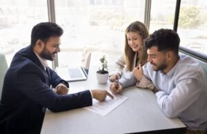 a group of people sitting around a table