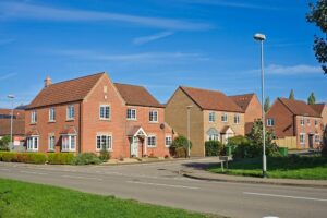 A row of houses on a quiet residential street.