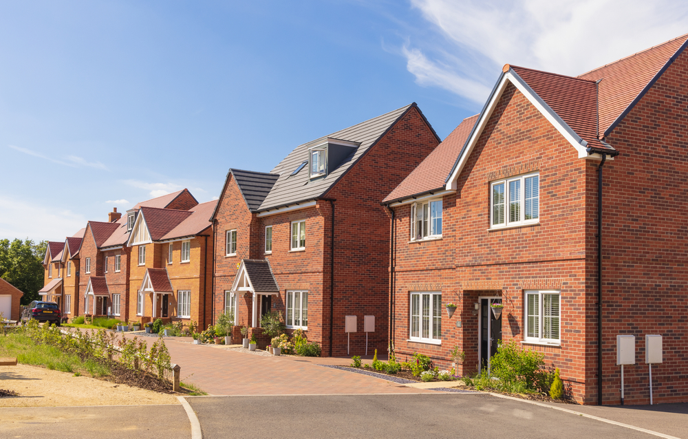 a-row-of-colorful-houses-lined-up-along-a-street
