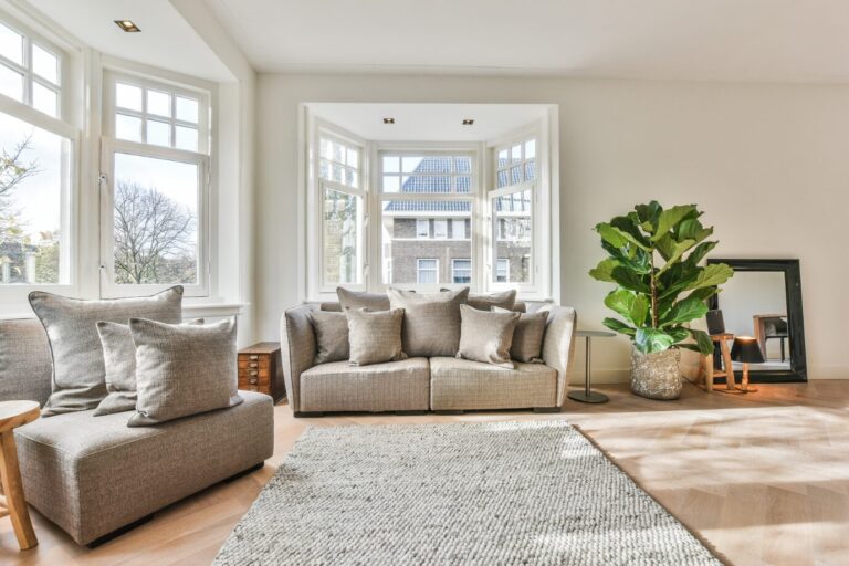 Stylish neutral living room in a boutique London rental.