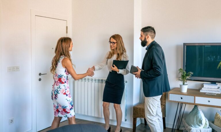Letting agent introducing new tenants to a rental property in Golders Green, London.